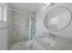 Updated bathroom featuring new tiling in the shower and a new sink and vanity at 4243 Hokan Ave, North Port, FL 34287