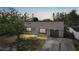 Charming single-story home features an attached garage and well-maintained landscaping at 4243 Hokan Ave, North Port, FL 34287