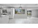 Beautiful kitchen featuring new pendant lighting, stainless appliances, and sliding door access to the backyard at 4243 Hokan Ave, North Port, FL 34287