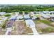 Picture of a quiet residential neighborhood featuring cozy homes and mature landscaping, creating an inviting atmosphere at 4290 Oak Terrace Cir, Port Charlotte, FL 33953