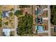 Aerial view showing the property boundaries and surrounding neighborhood, highlighting landscape and proximity to amenities at 4339 Boggs St, Port Charlotte, FL 33948