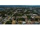 A neighborhood aerial view, showing the layout, landscaping, and proximity to waterways at 4339 Boggs St, Port Charlotte, FL 33948