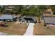 Well-kept property with solar panels, spacious driveway, and screened pool at 4339 Boggs St, Port Charlotte, FL 33948