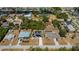 Aerial view of homes with spacious yards, driveways, and in-ground pools at 4339 Boggs St, Port Charlotte, FL 33948