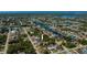 Aerial view of a canal-front neighborhood, showcasing the waterway system and home locations at 4339 Boggs St, Port Charlotte, FL 33948