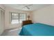 Bright bedroom with ample natural light, ceiling fan and dresser at 4339 Boggs St, Port Charlotte, FL 33948