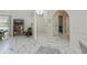 Bright entryway with marble flooring and open access to other living spaces at 4339 Boggs St, Port Charlotte, FL 33948