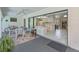 The lanai features a dining area, and open access to the kitchen and living room at 4339 Boggs St, Port Charlotte, FL 33948