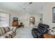 Living room featuring a ceiling fan and marble tile floor at 4339 Boggs St, Port Charlotte, FL 33948