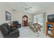 Bright and spacious living room with a ceiling fan and two sofas at 4339 Boggs St, Port Charlotte, FL 33948