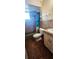 Bathroom featuring a shower and tub combination, toilet and vanity with neutral tones at 570 Mimosa Nw Ave, Port Charlotte, FL 33952