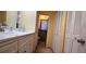 Spacious bathroom with a vanity, ample storage, and a separate toilet area at 570 Mimosa Nw Ave, Port Charlotte, FL 33952