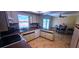 Bright eat-in kitchen with a view of the pool, plenty of counter space and seating at 570 Mimosa Nw Ave, Port Charlotte, FL 33952