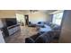 Spacious living area with tile floors, comfortable seating, and natural light at 570 Mimosa Nw Ave, Port Charlotte, FL 33952