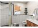 Bathroom with shower and tile throughout at 6604 Ranger Dr, Tampa, FL 33615