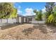 Home exterior with a covered porch, and plants surrounding the house at 6604 Ranger Dr, Tampa, FL 33615