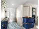 Entry way with blue tiled floors, and an ornate glass front door at 6604 Ranger Dr, Tampa, FL 33615