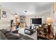 Open floorplan includes living room with ceiling fan, and tile flooring at 6604 Ranger Dr, Tampa, FL 33615