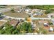 Aerial view of the property showcases the home and surrounding community at 6753 Thorman Rd, Port Charlotte, FL 33981
