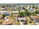 Well-maintained single story home with a fenced-in yard, mature trees, and landscaping at 6753 Thorman Rd, Port Charlotte, FL 33981