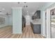 Kitchen featuring stainless steel appliances, grey cabinets and light countertops at 6753 Thorman Rd, Port Charlotte, FL 33981