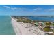 Breathtaking aerial view of pristine beaches and coastline along blue ocean at 9390 Little Gasparilla Island, Placida, FL 33946