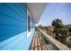 Side exterior view showing light blue paint and deck at 9390 Little Gasparilla Island, Placida, FL 33946
