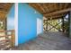 The wooden structure has a white door, white trim, and a ramp at 9390 Little Gasparilla Island, Placida, FL 33946