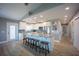 An open kitchen concept boasts a spacious island, sleek countertops, and contemporary stainless steel appliances at 9390 Little Gasparilla Island, Placida, FL 33946