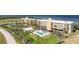 Bayfront condo with tennis court, pool, lush landscaping and mature palms at 101 N Marion Ct # 215, Punta Gorda, FL 33950