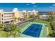Bayfront condo with tennis court, pool, lush landscaping and mature palms at 101 N Marion Ct # 215, Punta Gorda, FL 33950