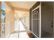 Exterior hallway of building, featuring a welcome mat and view of the walkway at 101 N Marion Ct # 215, Punta Gorda, FL 33950