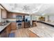 Bright kitchen features stainless steel appliances and granite countertops at 101 N Marion Ct # 215, Punta Gorda, FL 33950