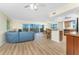 Open-concept living space boasts of hardwood floors, balcony access, and scenic views at 101 N Marion Ct # 215, Punta Gorda, FL 33950