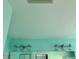 Bright bathroom featuring light fixtures and light-colored walls and ceiling at 1025 Boundary Blvd, Rotonda West, FL 33947