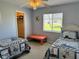 Shared bedroom with twin beds, closet, and nautically inspired design at 1025 Boundary Blvd, Rotonda West, FL 33947