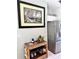 Modern kitchen area next to wine and glass rack featuring stainless steel appliances and elegant decor at 1025 Boundary Blvd, Rotonda West, FL 33947