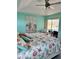 Inviting main bedroom with pool views, coastal decor, and light-filled ambiance at 1025 Boundary Blvd, Rotonda West, FL 33947