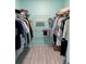 Walk-in closet featuring shelving, hanging rods, and ample space for storage at 1025 Boundary Blvd, Rotonda West, FL 33947