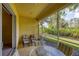 Inviting lanai offers relaxation with views of lush backyard landscaping at 1215 Jonah Dr, North Port, FL 34289