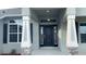 Elegant front entrance with sidelights and transom window at 13236 Pace Cir, Port Charlotte, FL 33981