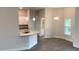 Kitchen area with granite countertops and modern white cabinets at 13236 Pace Cir, Port Charlotte, FL 33981