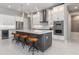 Gourmet kitchen with stainless steel appliances, large center island, and breakfast bar at 1330 Mineo Dr, Punta Gorda, FL 33950