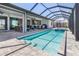 Enjoy this beautiful pool and spa with spacious outdoor living and patio in a screened enclosure at 1330 Mineo Dr, Punta Gorda, FL 33950