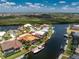 Waterfront home with private boat dock, lush landscaping and stunning water views in a quiet neighborhood at 1367 Grebe Dr, Punta Gorda, FL 33950