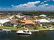 Waterfront home with private boat dock, lush landscaping and stunning water views in a quiet neighborhood at 1367 Grebe Dr, Punta Gorda, FL 33950
