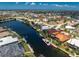 Waterfront home with private boat dock, lush landscaping and stunning water views in a quiet neighborhood at 1367 Grebe Dr, Punta Gorda, FL 33950