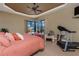 Comfortable bedroom featuring a view of the pool area, creating a relaxing atmosphere at 1367 Grebe Dr, Punta Gorda, FL 33950