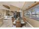 Dining room with vaulted ceilings and water views at 1367 Grebe Dr, Punta Gorda, FL 33950