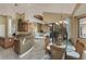 Open concept floor plan showing dining room view to the kitchen and living room at 1367 Grebe Dr, Punta Gorda, FL 33950